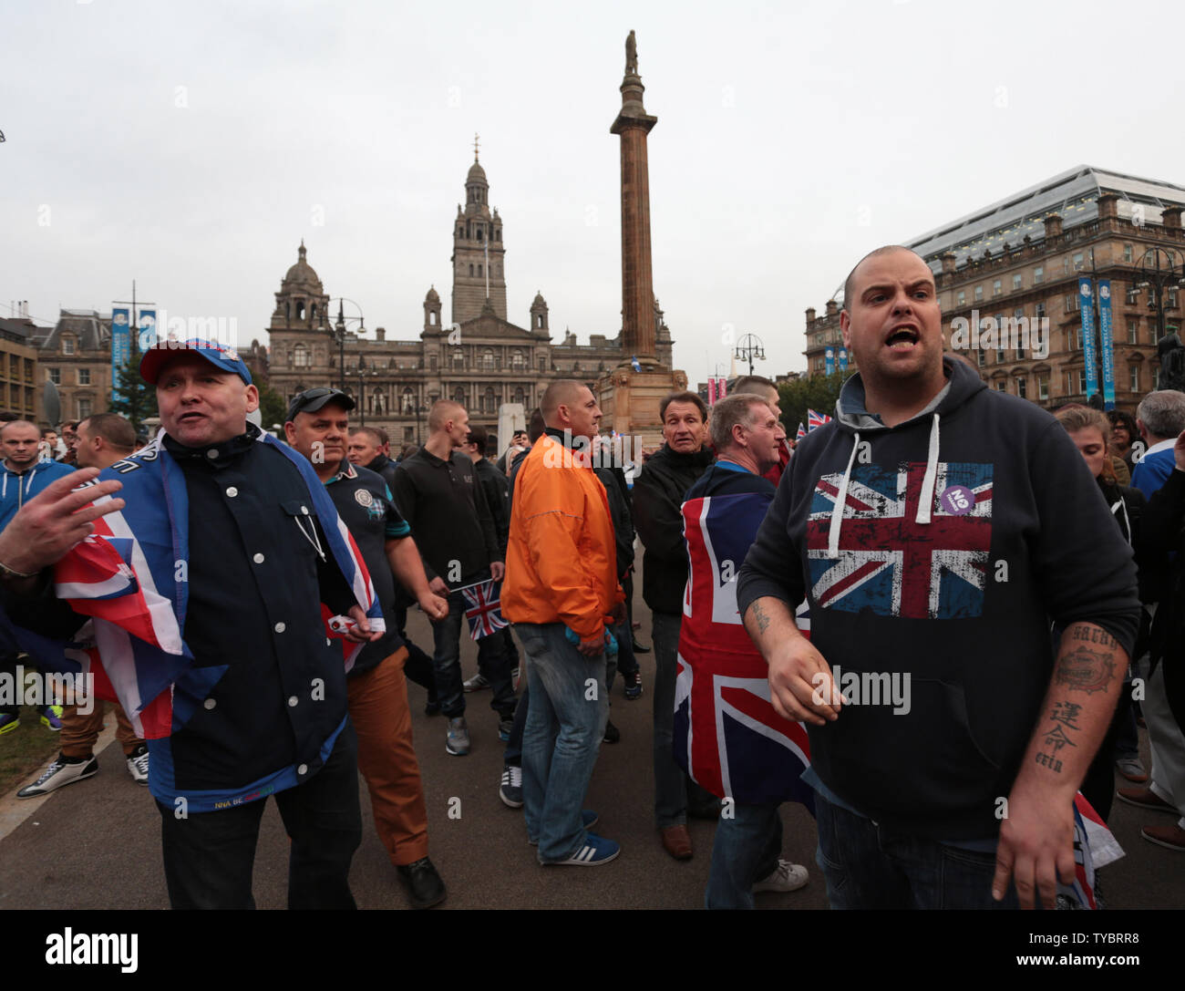 Pro-Unionist voters taunt Yes vote campaigners in George Sq in Glasgow,Scotland on September 19, 2014. Pro Union voters won the referendum by Fifty-Five percent to Forty-Five percent. The First Minister of Scotland Alex Salmond has resigned today following the referendum vote.      UPI / Hugo Philpott Stock Photo
