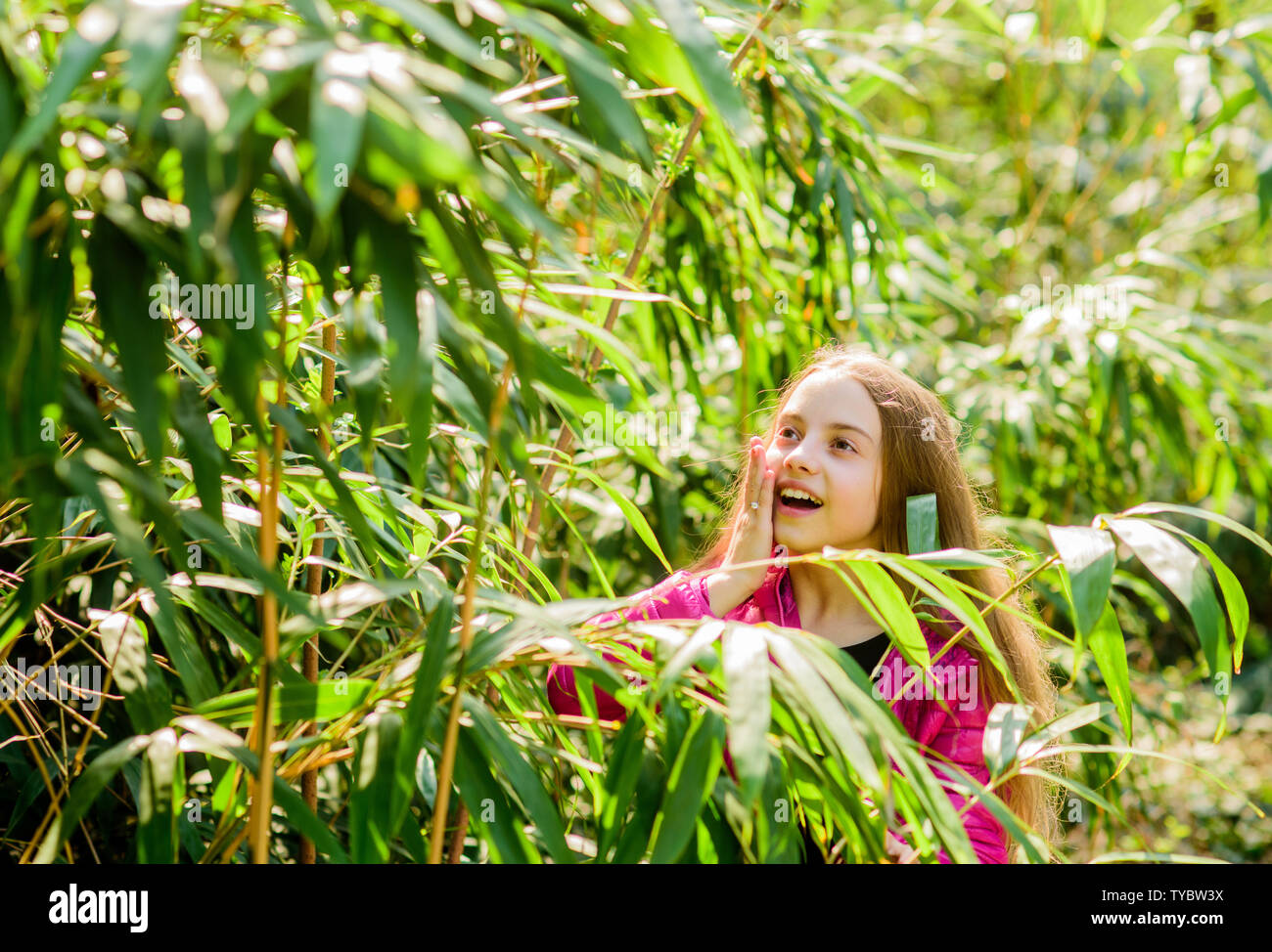 Excursion to botanical garden. Plants grown for display to public. Girl