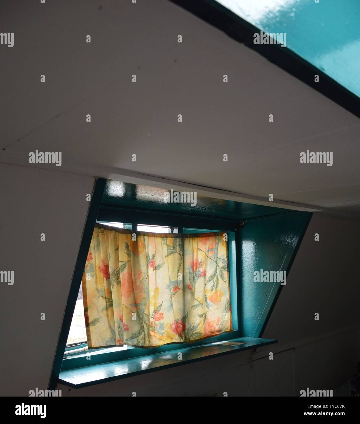 Curtains In Retro Style Hanging In Front Of A Window On A Sunny