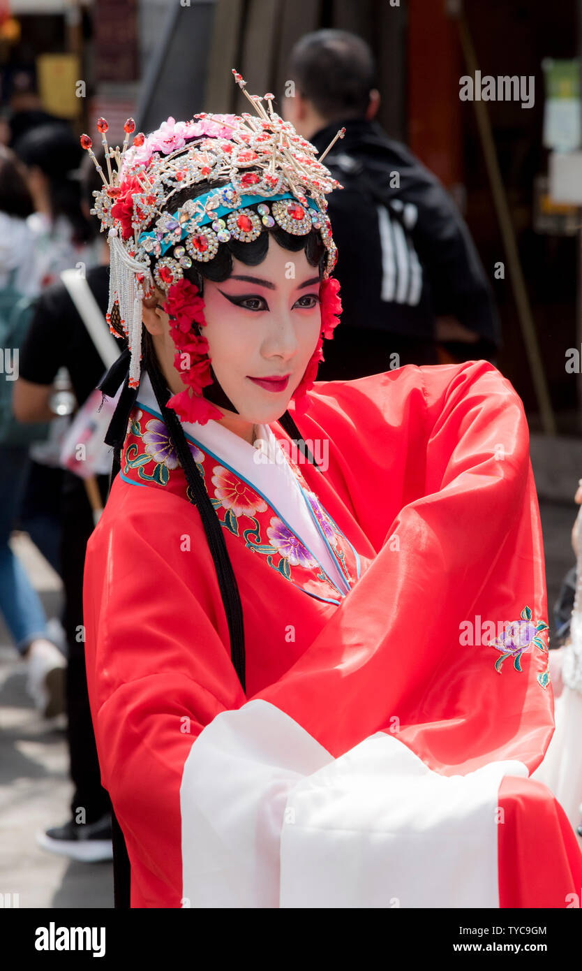 Actress with make up and Traditional Chinese Opera headdress. Photographed in Chengdu, Sichuan, China Stock Photo