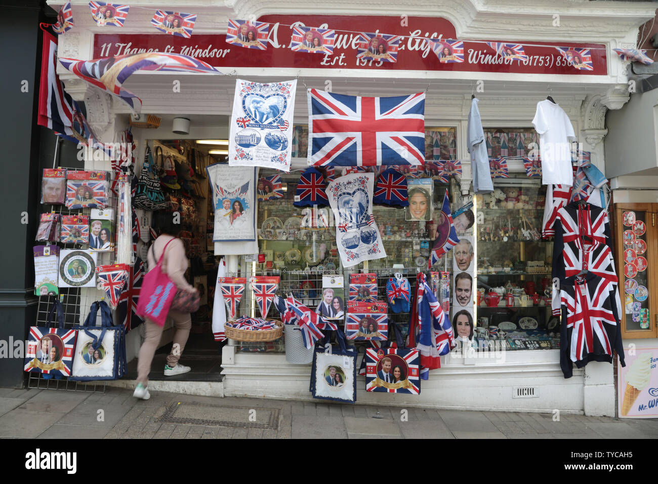 A Tourist Enters A Shop Decorated Especially For The Wedding Of