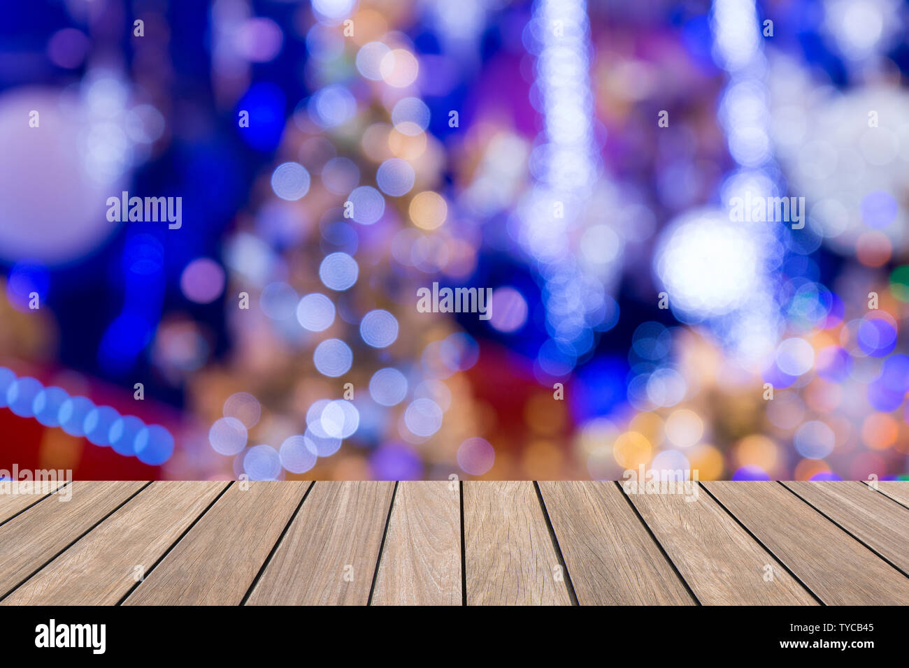 Christmas holiday background with empty wooden deck table over festive  bokeh. Ready for product montage Stock Photo - Alamy