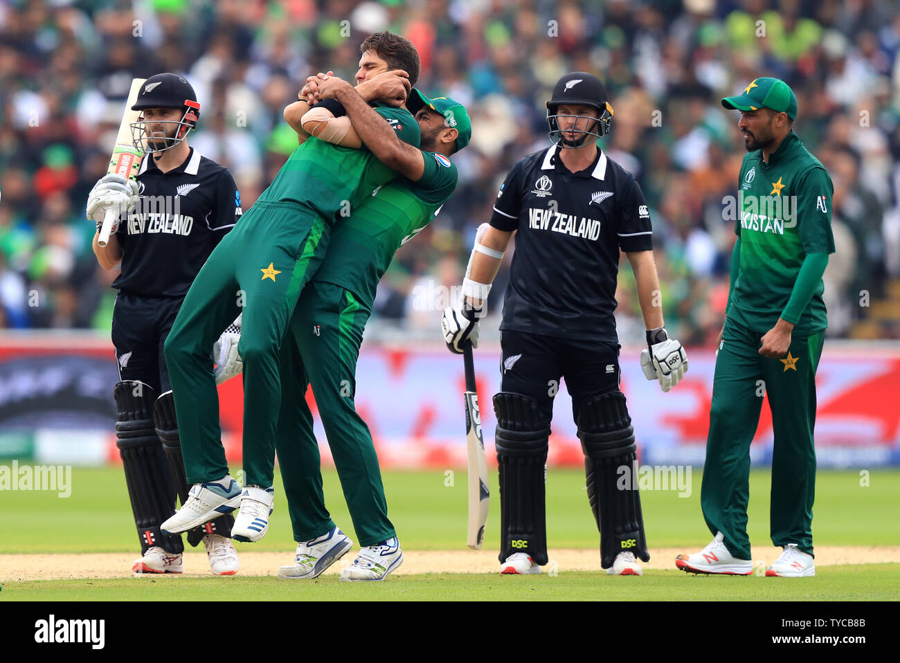 Pakistan’s Wahab Riaz helps Shaheen Afridi to stretch during a break in ...
