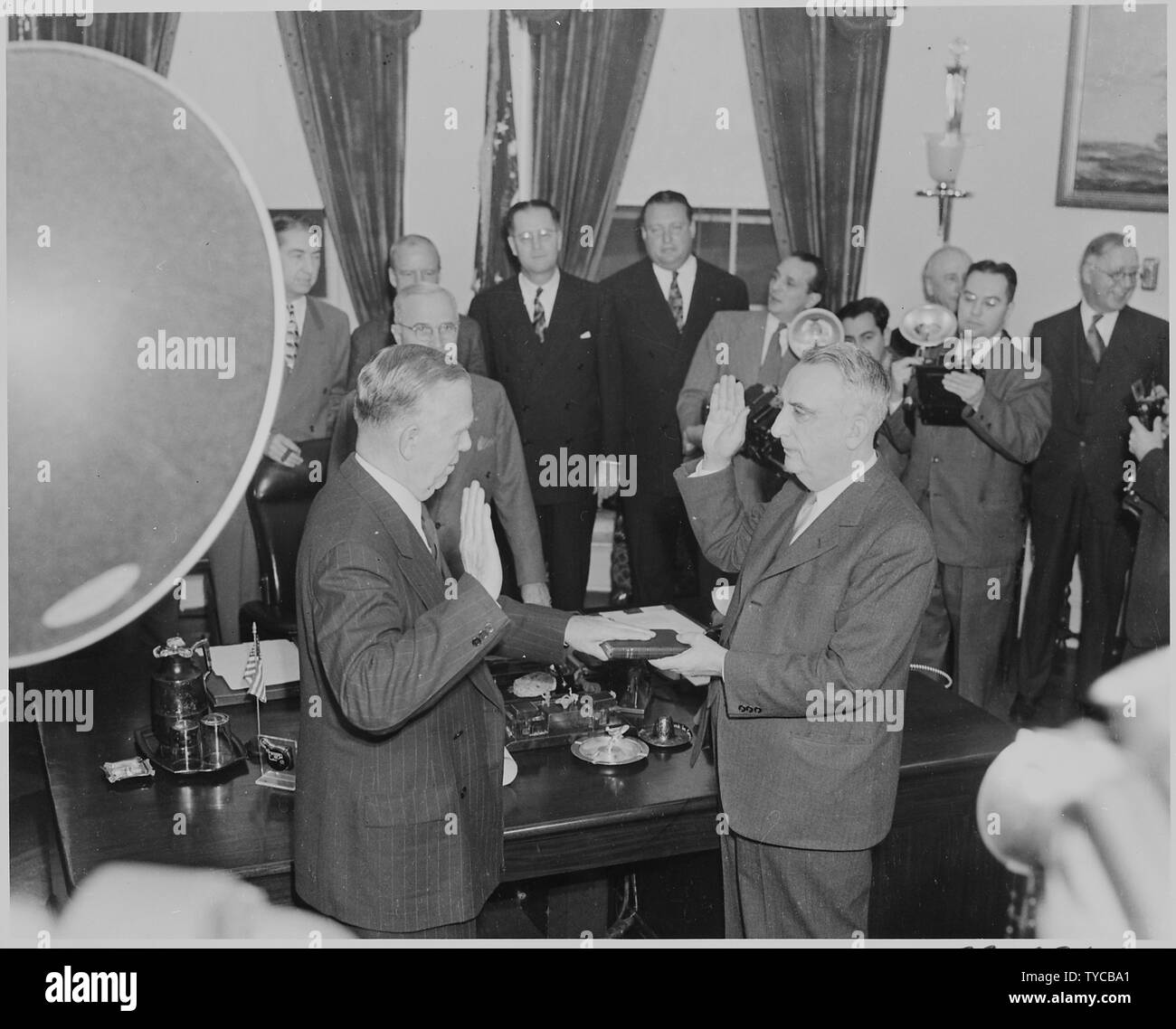 Photograph of George C. Marshall being sworn in as Secretary of State