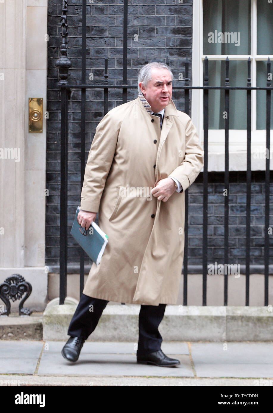 British Attorney General Geoffrey Cox leaves No.10 Downing St. after a meeting with the Prime Minister Theresa May in London on March 13, 2019. Parliament faces a new vote on Brexit today       Photo by Hugo Philpott/UPI Stock Photo