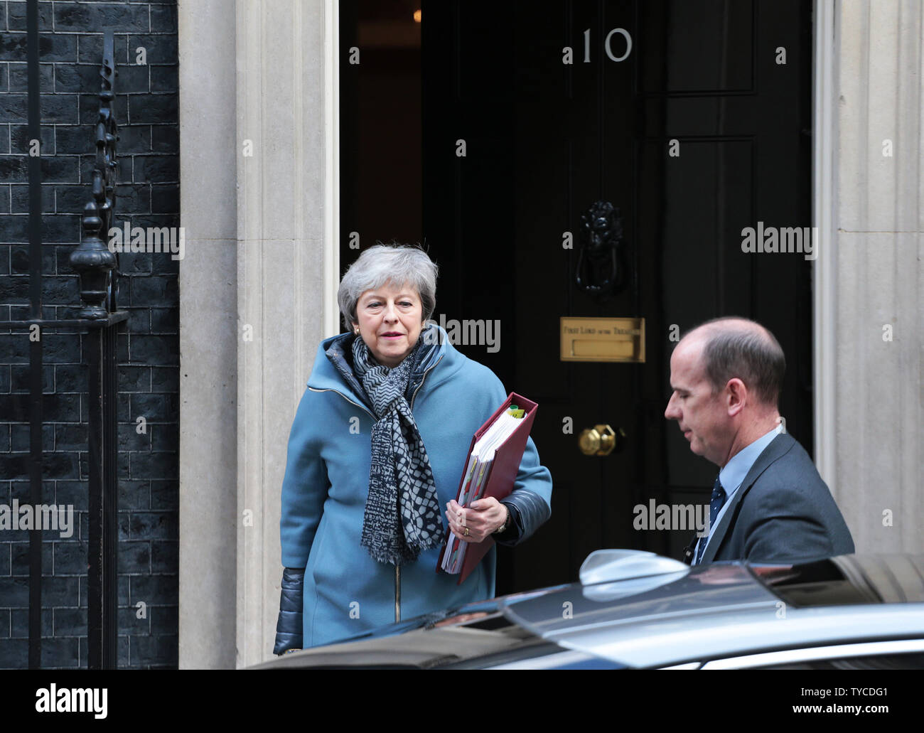 British Prime Minister Theresa May leaves No.10 Downing Street for the Houses of Parliament in London, April 03, 2019. Mrs May is due to have talks with the Leader of the opposition Jeremy Corbyn to give her a chance of securing a Brexit deal before April 12th or the United Kingdom will crash out of the European Union without a deal.            Photo by Hugo Philpott/UPI Stock Photo