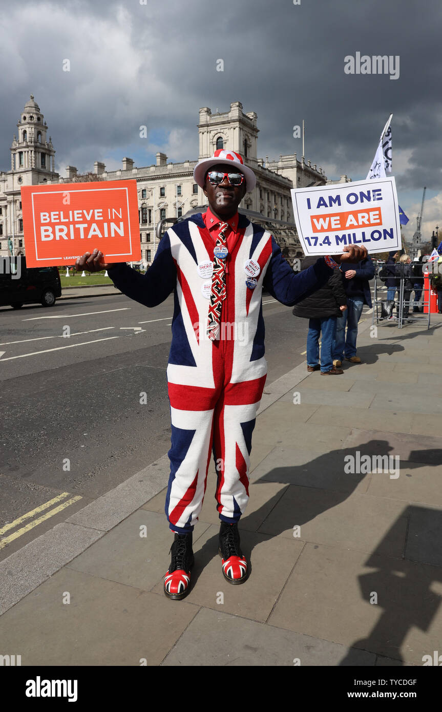 A Brexit protestor campaigns outside the Houses of Parliament in London, April 03, 2019. Theresa May is due to have talks with the Leader of the opposition Jeremy Corbyn to give her a chance of securing a Brexit deal before April 12th or the United Kingdom will crash out of the European Union without a deal.            Photo by Hugo Philpott/UPI Stock Photo