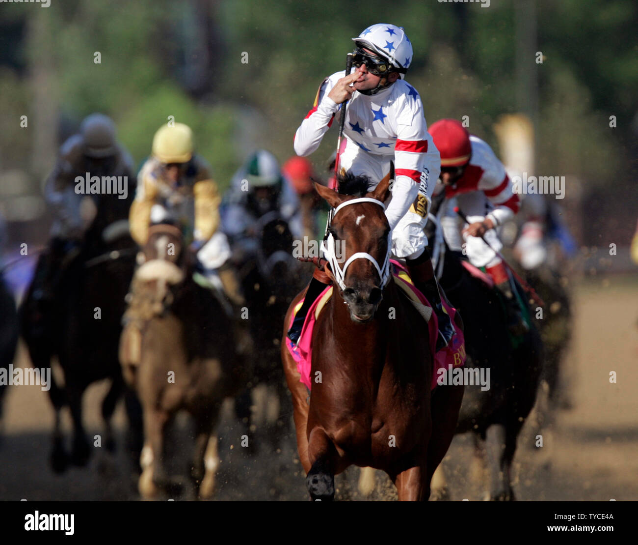 Big Brown, with jockey Kent Desormeaux (C) leads the pack en route to winning the 134th running of the Kentucky Derby at Churchill Downs in Louisville, Kentucky on May 3, 2008. (UPI Photo/Mark Cowan) Stock Photo