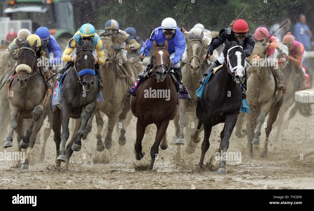 The field rounds turn four during the 135th running of the Kentucky