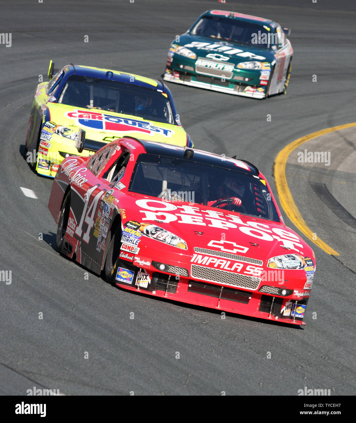 Tony Stewart leads Mark Martin and Dale Earnhardt Jr through turn 4  in the NASCAR Sylvania 300 at New Hampshire Motor Speedway in Loudon, New Hampshire, September 20, 2009.  UPI/Malcolm Hope Stock Photo