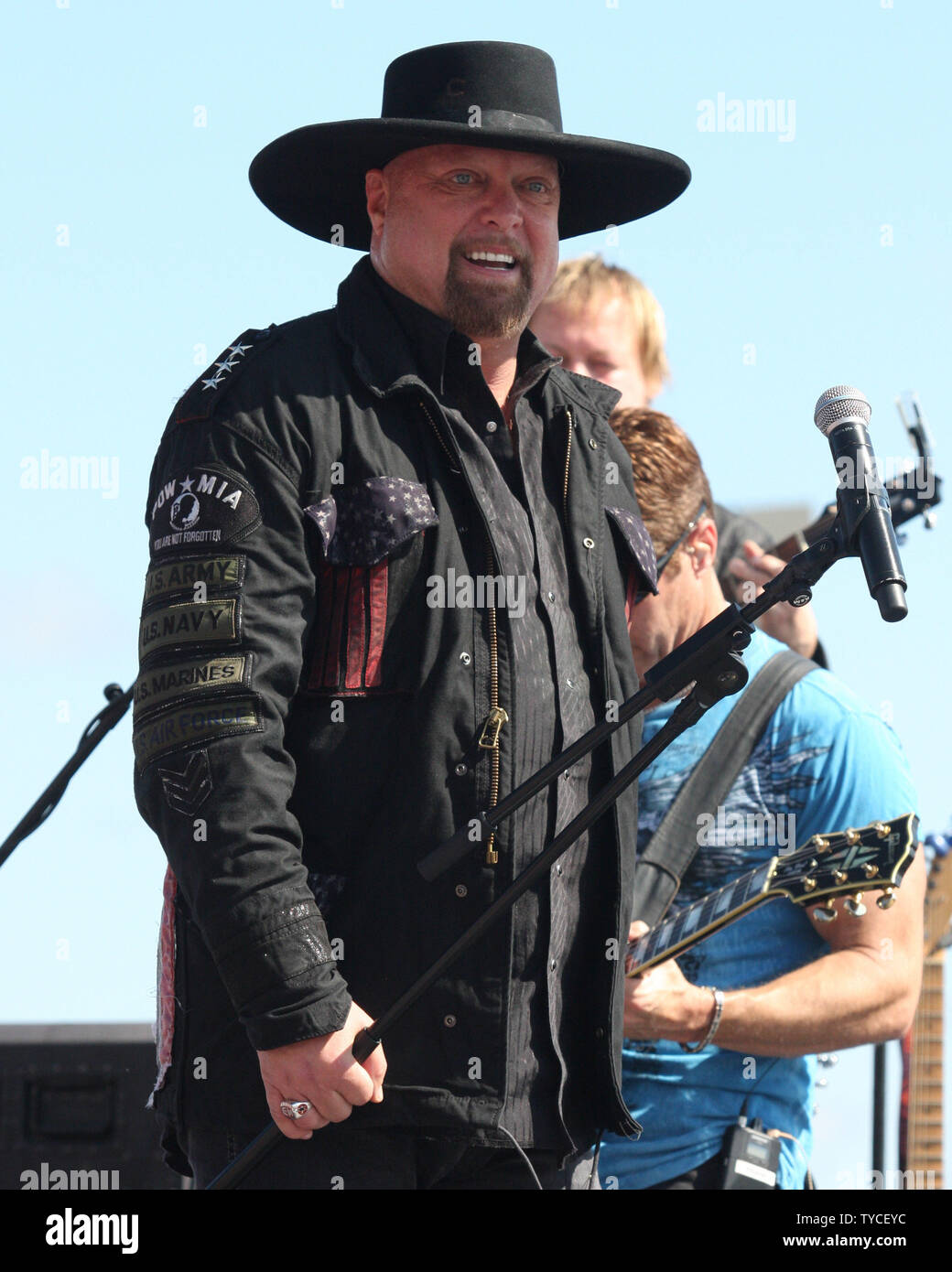Eddie Montgomery of the country music duo Montgomery Gentry perfoms before the start of the NASCAR Sprint Cup Series Sylvania 300 at New Hampshire Motor Speedway in Loudon, New Hampshire on September 25, 2011.  UPI/Malcolm Hope Stock Photo