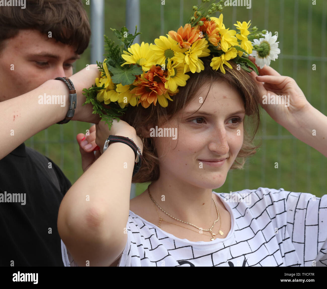 Krakow. Cracow. Poland. Girls and women wearing floral wreaths at the  annual midsummer festival "Wreaths" ("Wianki" in Polish Stock Photo - Alamy