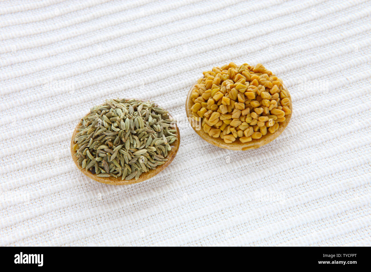 Close up of fennel seeds and fenugreek seeds in bowls Stock Photo Alamy Close up of fennel seeds and fenugreek seeds in bowls Stock Photo Alamy