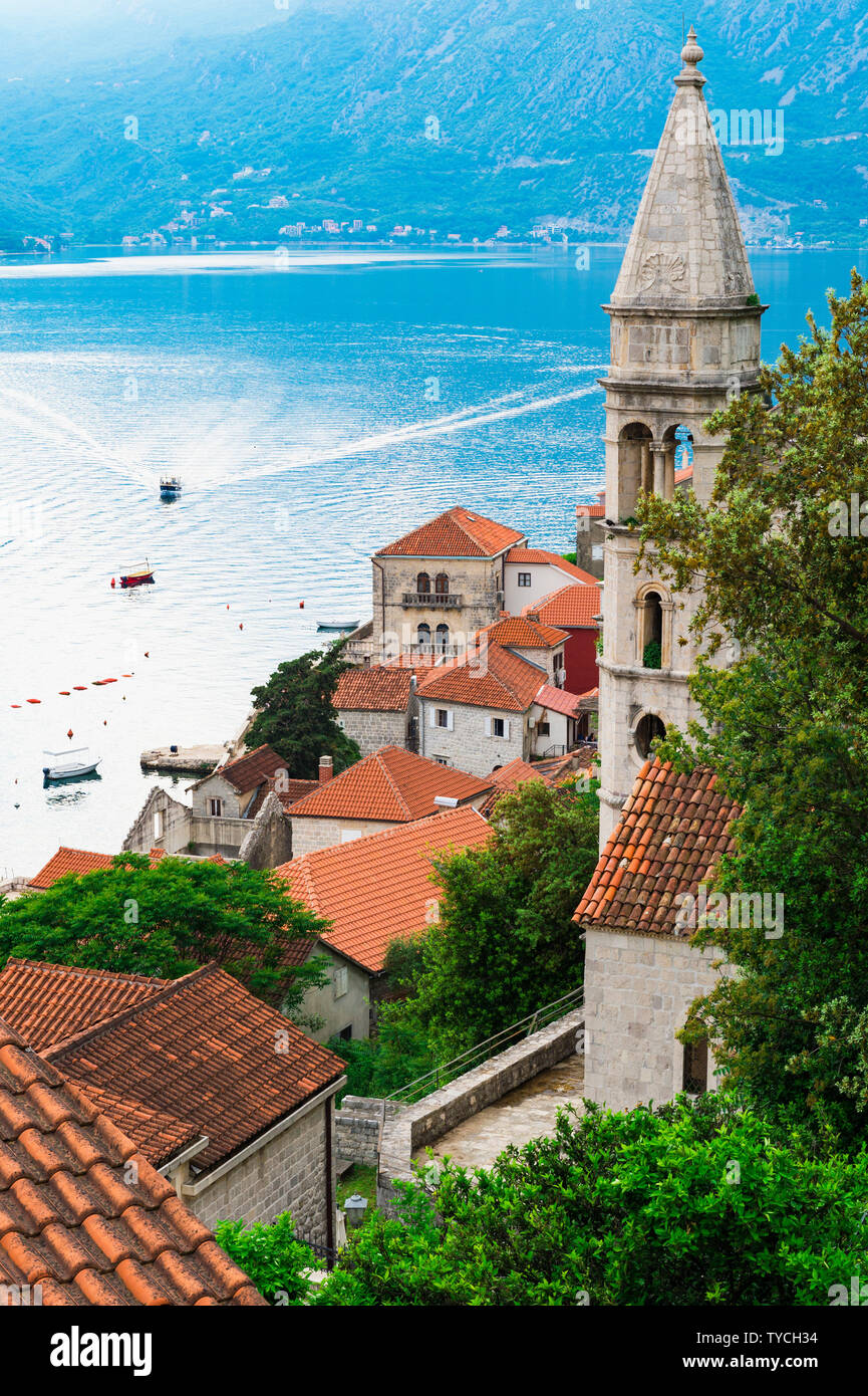 Old Church bell tower overlooking Kotor Bay, Perast old town, Montenegro Stock Photo
