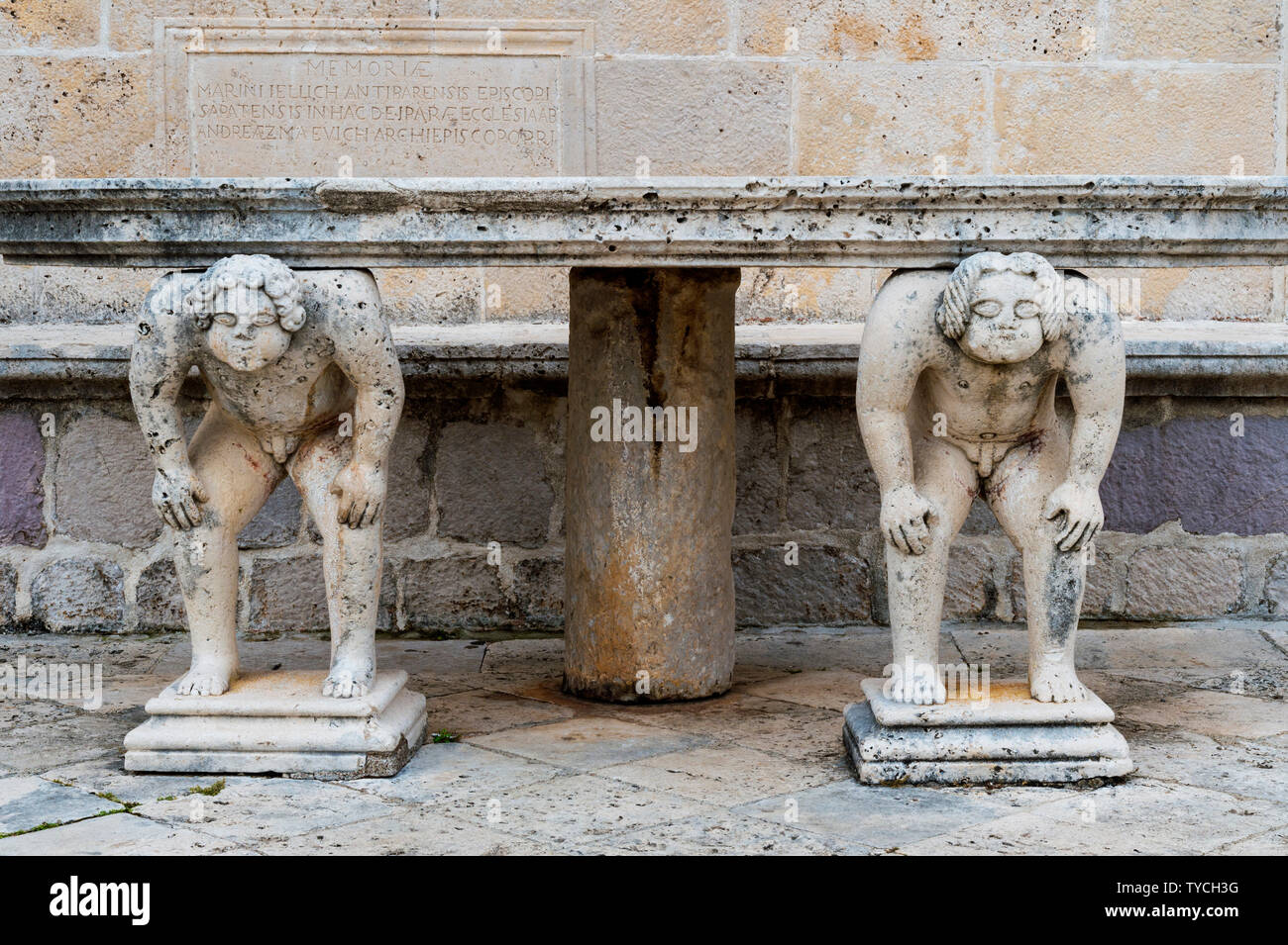 Sculpture supporting stone table, Our Lady of the Rocks artificial island, Kotor Bay, Perast, Montenegro Stock Photo