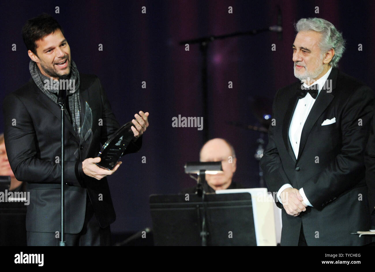 Ricky Martin (L) presents Placido Domingo with the Latin Recording Academy Person of the Year Award, at the Mandalay Bay in Las Vegas, Nevada on November 10, 2010.  UPI/Jim Ruymen Stock Photo