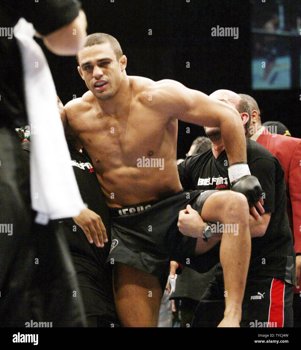 Vitor Belfort of Brazil takes champion Randy Couture's UFC Light Heavyweight title in :48 of round 1 when Couture suffered a deadly cut on the lower left eyelid before 17,000 fans at Mandalay Bay in Las Vegas, January 31, 2004. (UPI Photo/Roger Williams) Stock Photo