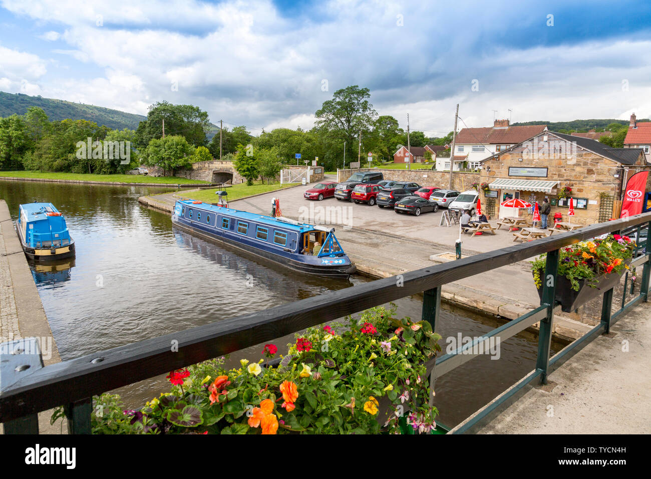Colourful holiday narrowboats in Trevor Basin on the Llangollen Canal, Clwyd, Wales, UK Stock Photo