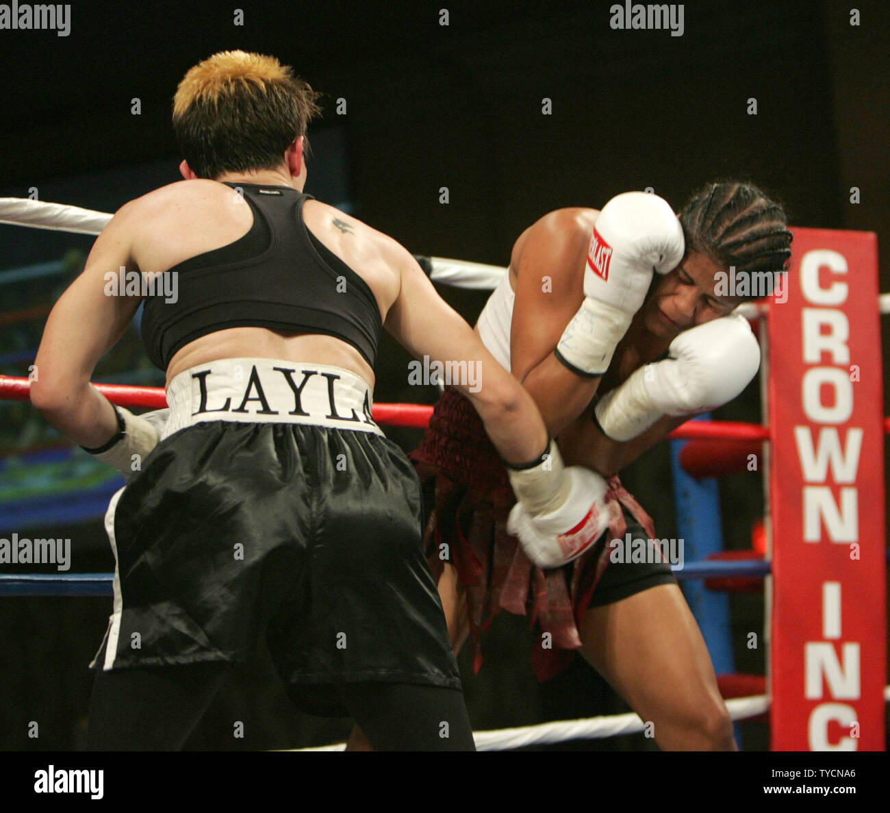 Layla McCarter of Las Vegas (left) attacks Belinda Laracuente of Puerto Rico on her way to winning the vacant Girls Boxing Union lightweight title in a 10 round decision at Orleans Hotel and Casino in Las Vegas on November 17, 2006. This was the first fight in history where women fought three minute rounds. (UPI Photo/Roger Williams) Stock Photo