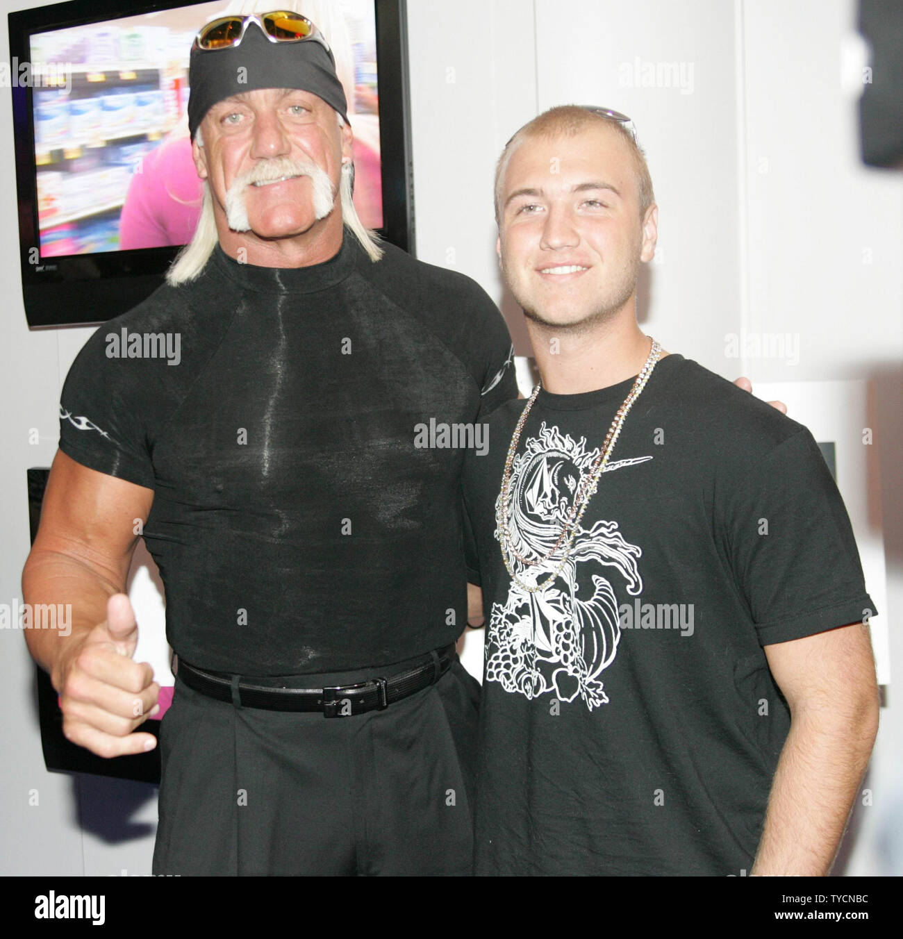 Wrestleractor Hulk Hogan and his son Nick are seen at the Polaroid