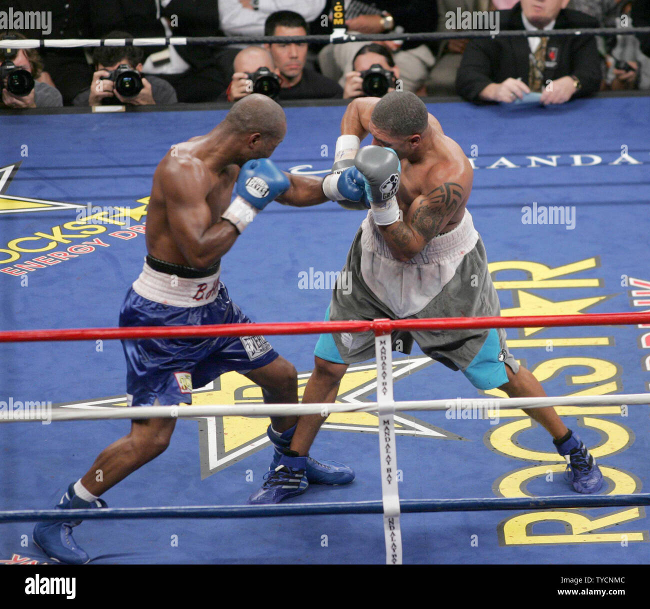 Champion Bernard Hopkins (L) hits challenger Winky Wright with a left during the Ring Magazine Light Heavyweight title fight at Mandalay Bay in Las Vegas on July 21, 2007. Hopkins won by decision.  (UPI Photo/Roger Williams) Stock Photo