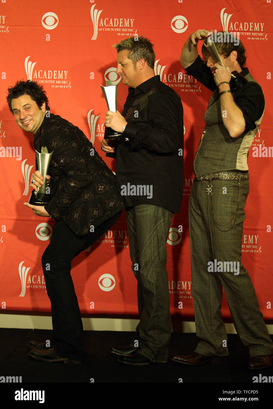 Rascal Flatts appears backstage after receiving the Humanitarian Award ...