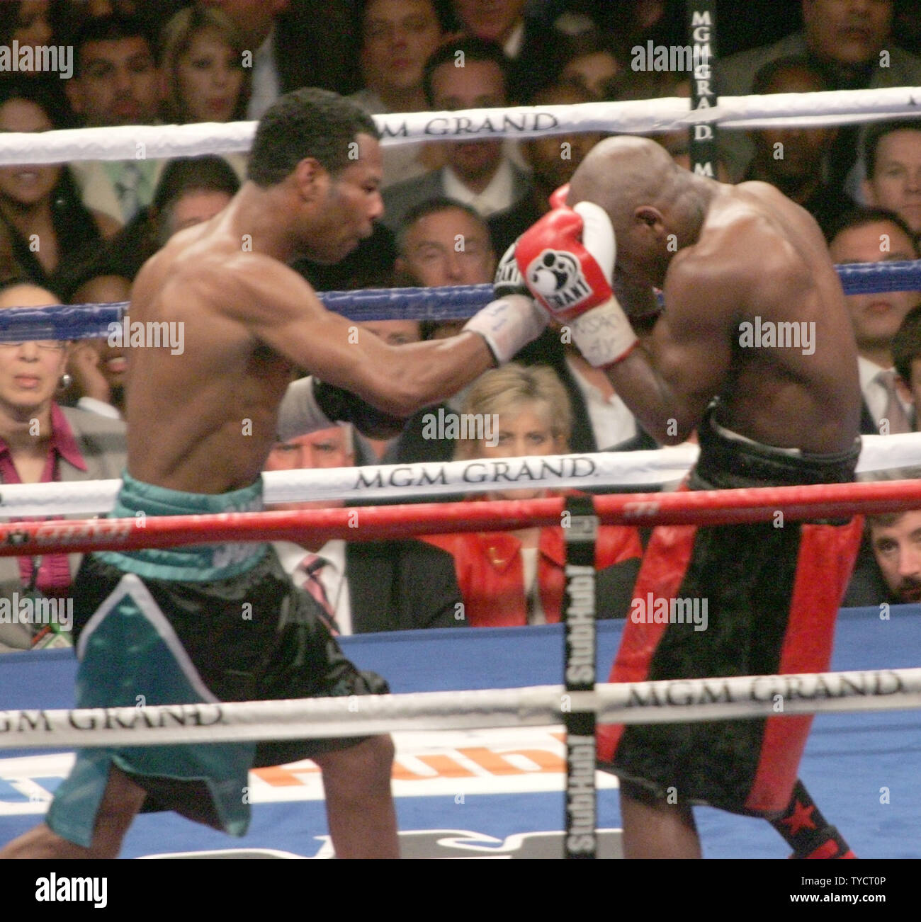 Shane Mosley (L) boxes Floyd Mayweather during their fight at MGM Grand ...