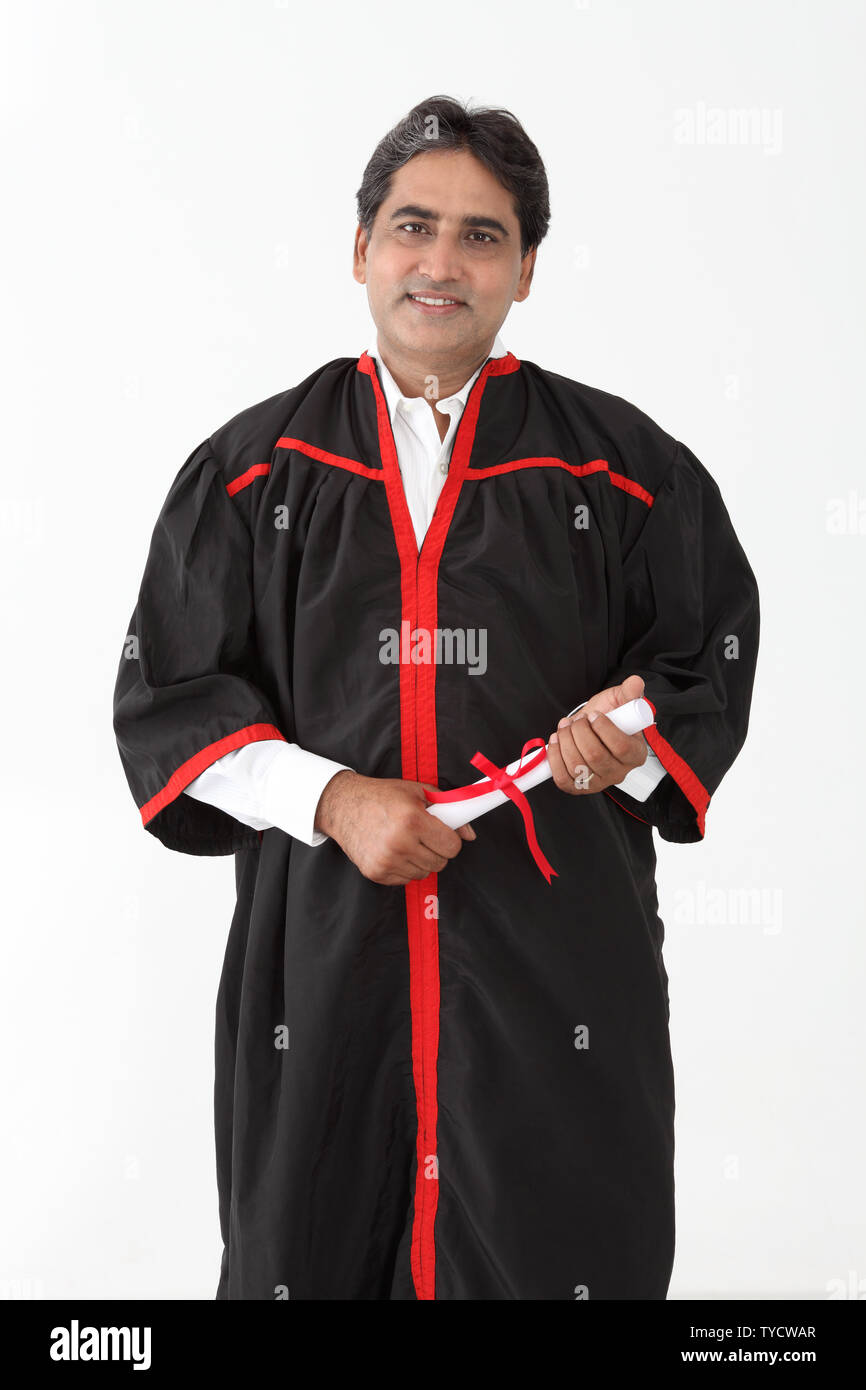 Mature student holding graduation degree Stock Photo Alamy