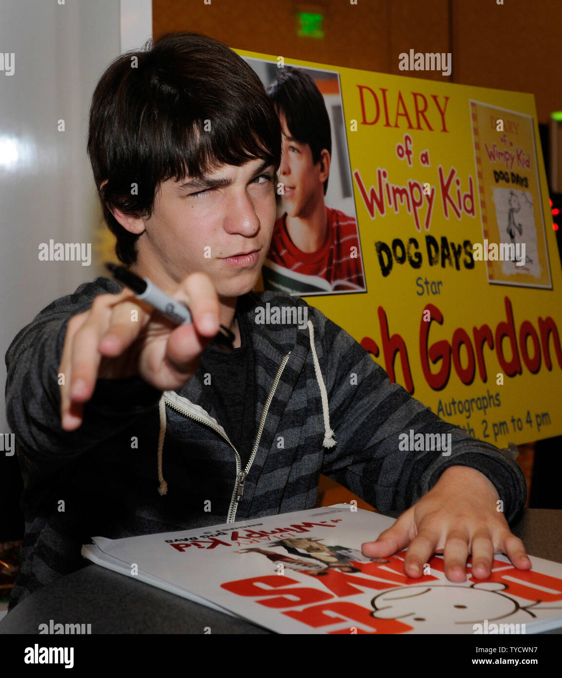 Actor Zachary Gordon signs autographs to promote his upcoming movie