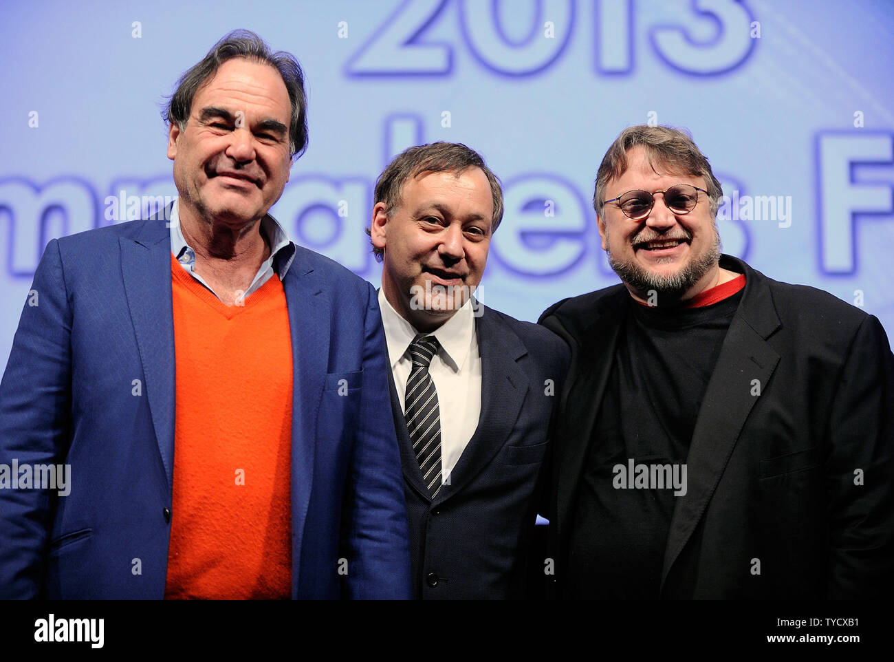 (L-R) Directors Oliver Stone, Sam Raimi and Guillermo del Toro pose after speaking at a filmmakers' roundtable at Caesars Palace during CinemaCon, the official convention of the National Association of Theatre Owners in Las Vegas, Nevada on April 17, 2013. UPI/David Becker Stock Photo