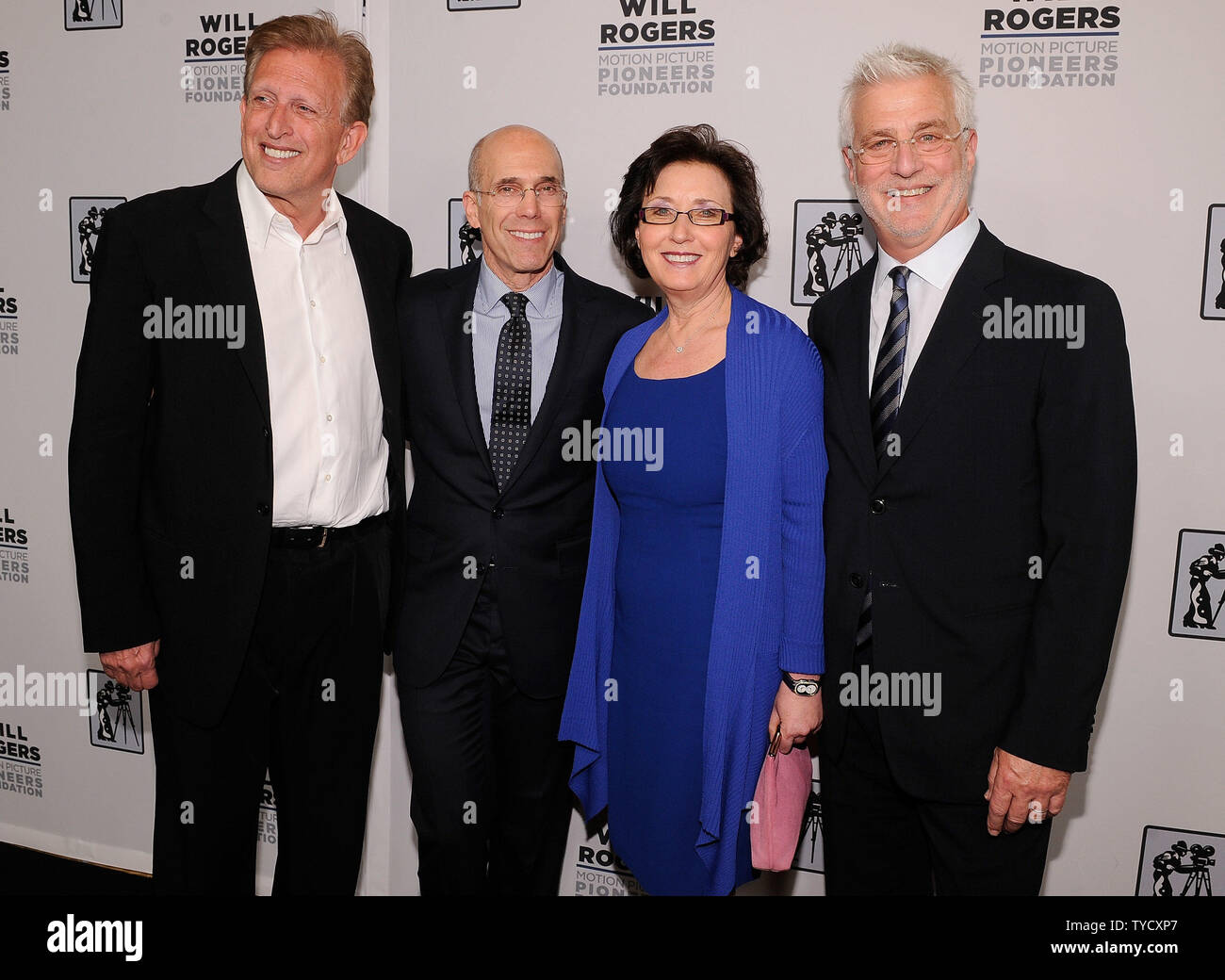 (L-R) Producer Joe Roth, DreamWorks Animation CEO Jeffrey Katzenberg, Madeline Sherak and Lionsgate Motion Picture Group Co-Chairman Rob Friedman arrive at the 2014 Will Rogers ?Pioneer of the Year? Dinner Honoring Tom Sherak at Caesars Palace during CinemaCon, the official convention of the National Association of Theatre Owners, in Las Vegas, Nevada on March 26, 2014. UPI/David Becker Stock Photo