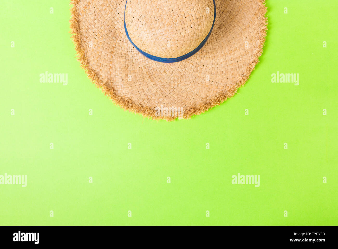 yellow retro straw hat top view with copy space. summer concept on ...