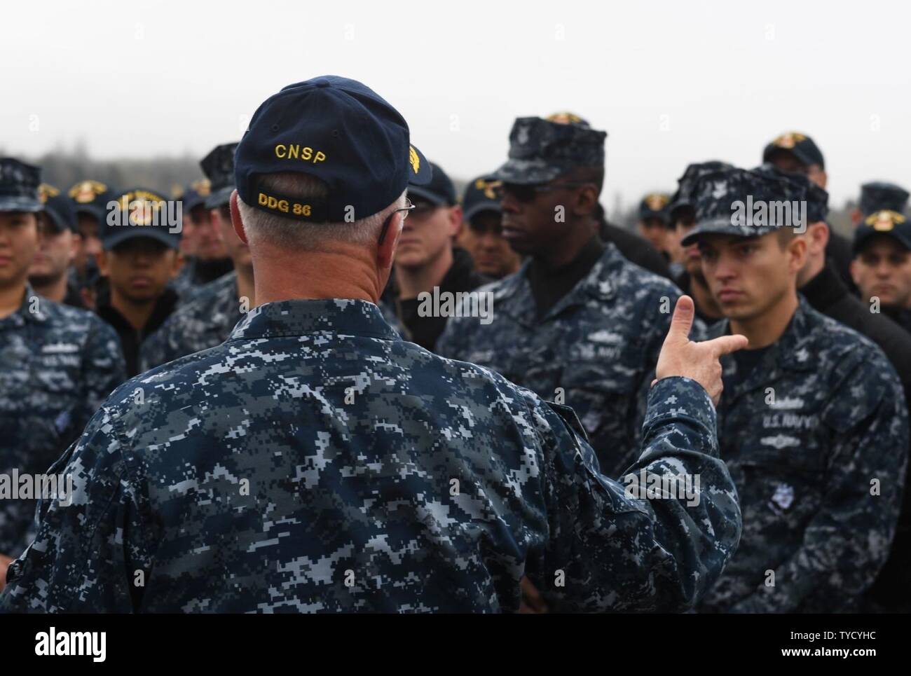 EVERETT, Wash. (Nov. 1, 2016) Vice Adm. Thomas Rowden, commander, Naval Surface Forces, U.S. Pacific Fleet, speaks to Sailors assigned to the Arleigh Burke-class guided-missile destroyer USS Shoup (DDG 86) during his visit to Naval Station Everett. Ship visits provide Rowden, who oversees combat, material and personnel readiness of surface ships in the Pacific Fleet, an opportunity to meet the crew and discuss initiatives and receive feedback directly from Sailors. Stock Photo
