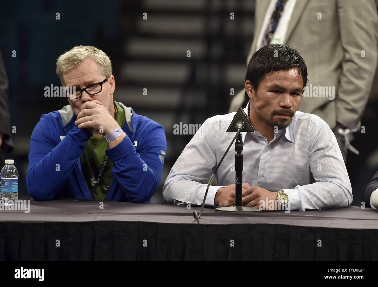 Manny Paciquiao, right, and his trainer, Freddie Roach look on during a news conference after his welterweight unification bout against Floyd Mayweather Jr. at MGM Grand Garden Arena Saturday, May 2, 2015, in Las Vegas, Nevada. Mayweather won with an unanimous decision after the 12 round fight. Photo by David Becker/UPI Stock Photo