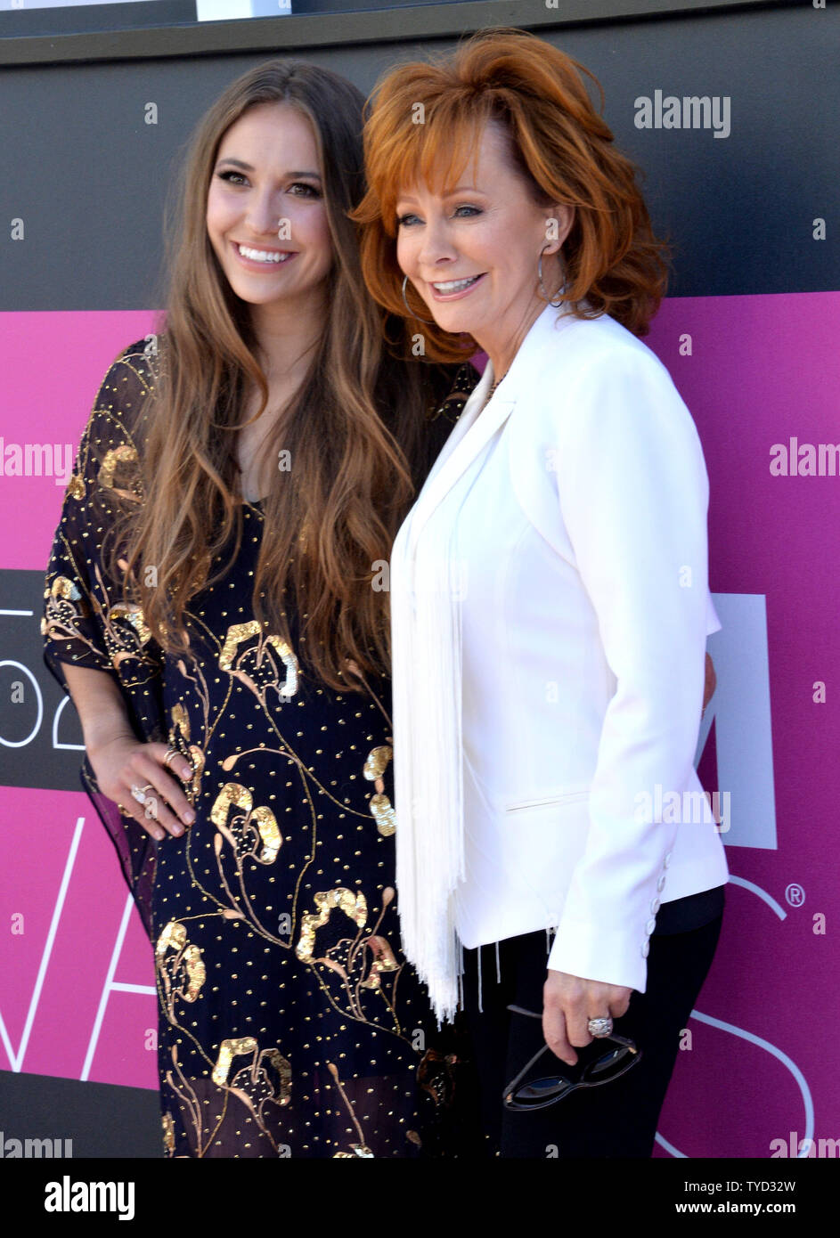 Recording artists Lauren Daigle (L) and Reba McEntire attend the 52nd annual Academy of Country Music Awards held at T-Mobile Arena in Las Vegas, Nevada on April 2, 2017. The show will be telecast live on CBS.   Photo by Jim Ruymen/UPI Stock Photo