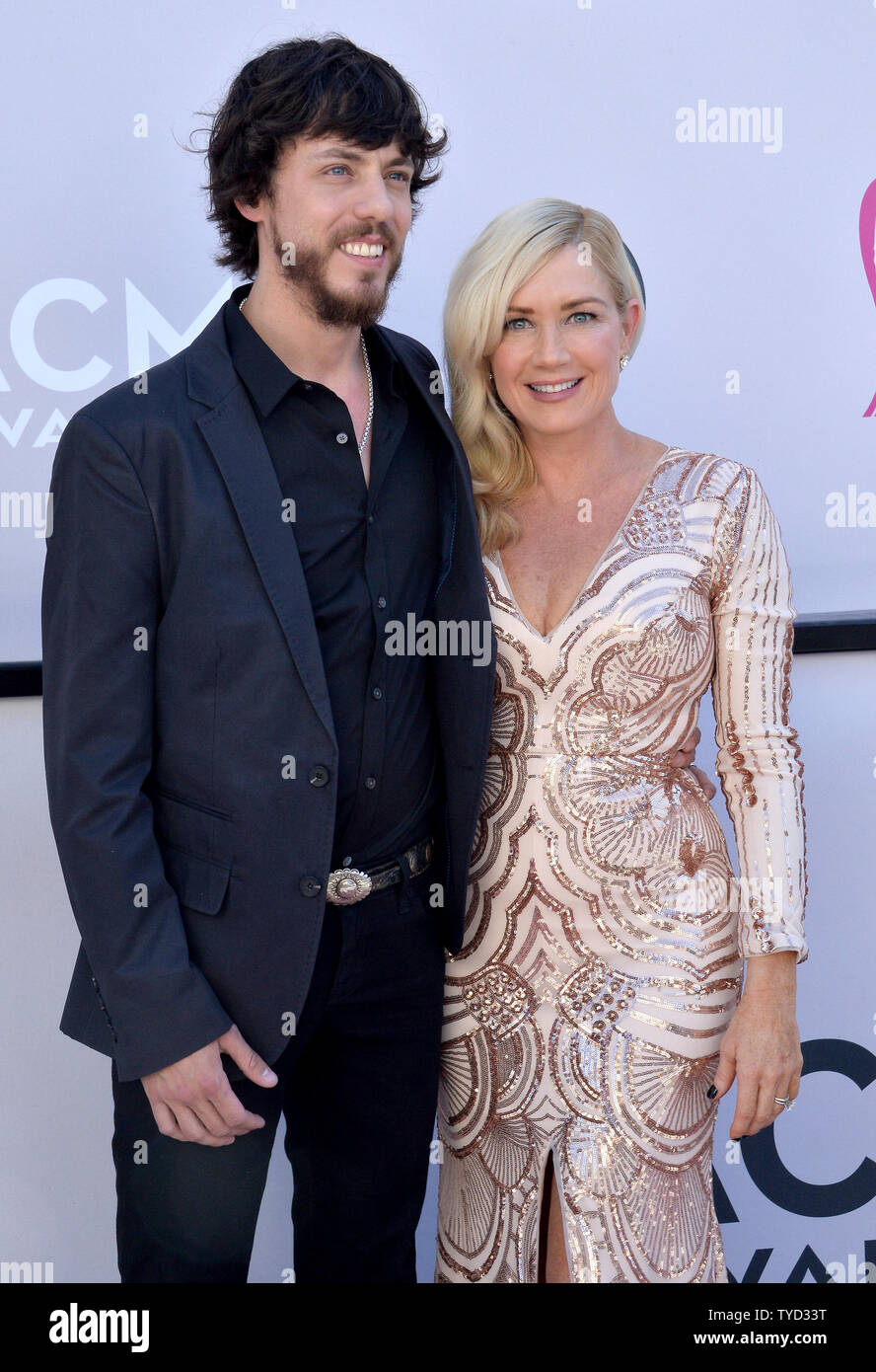 Recording artist Chris Janson (L) and Kelly Lynn attend the 52nd annual