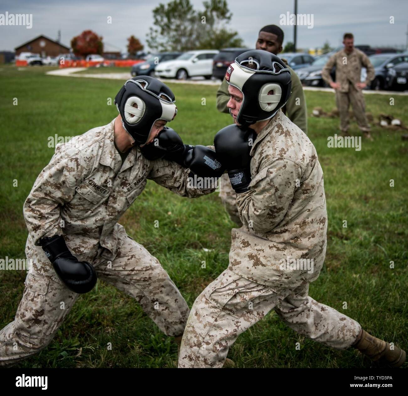 Lance Cpl. Tanner J. Commerer absorbs a punch to his nose from PFC