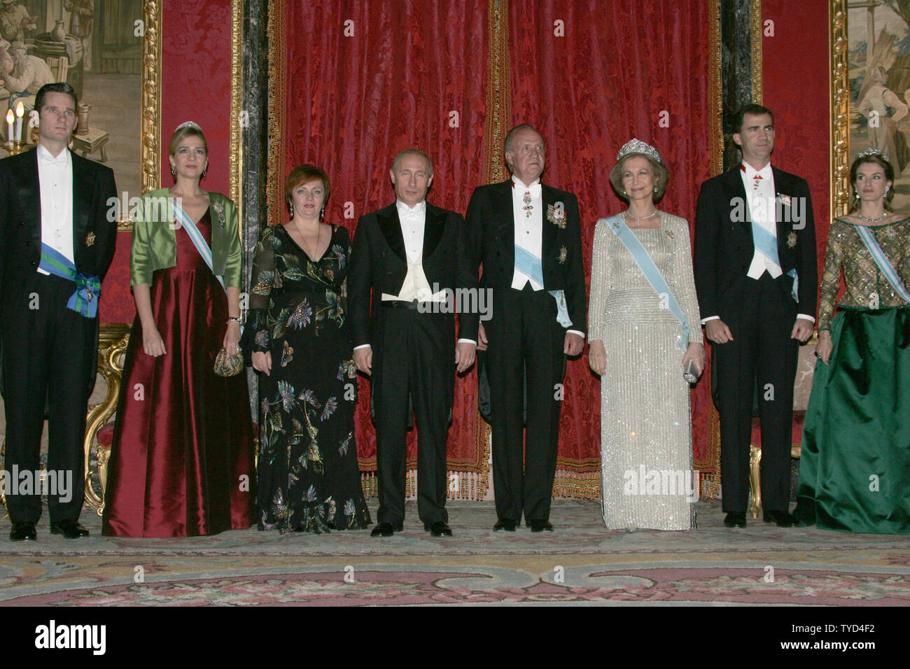 From left to right: Spanish Prince Inaki Urdangarin, his wife Cristina, Russian first lady Lyudmila Putin, Rusian President Vladimir Putin, King Juan Carlos, Queen Sofia, Prince Felipe and his wife Letizia pose for a photo before their private dinner at Royal Palace in Madrid, February 8, 2006. Putin is in Spain on a two-day state visit to discuss  international terrorism and Russian cooperation with international organizations to prevent terrorism. (UPI Photo/Anatoli Zhdanov) Stock Photo