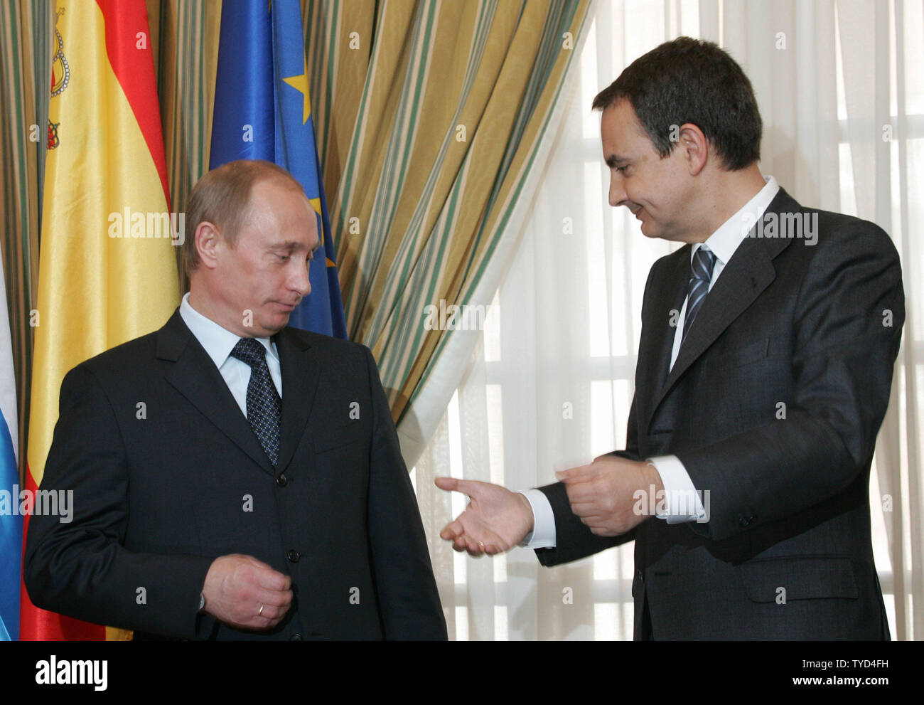 russian-president-vladimir-putin-l-speaks-with-spanish-prime-minister-jose-luis-rodriguez-zapatero-after-their-joint-news-conference-at-moncloa-palace-in-madrid-february-9-2006-putin-is-in-spain-on-a-two-day-state-visi-upi-photoanatoli-zhdanov-TYD4FH.jpg