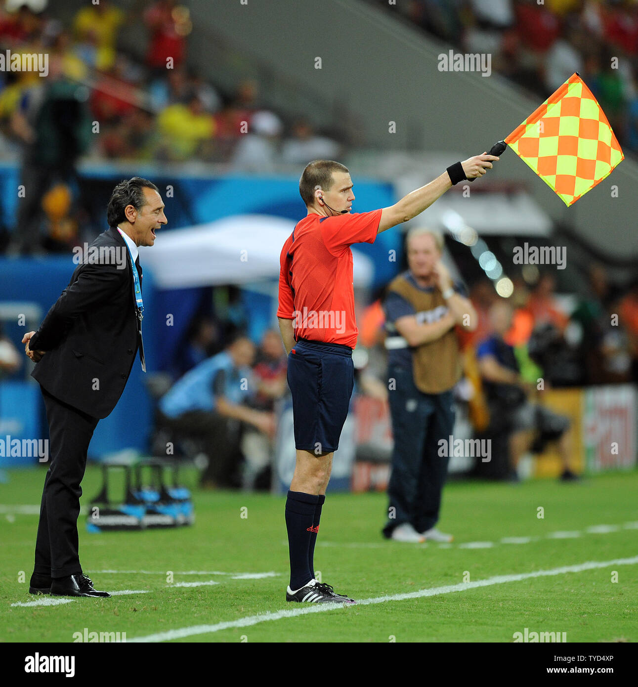 Italy manager Cesare Prandelli complains to the assistant referee during the 2014 FIFA World Cup Group D match at the Arena Amazonia in Manaus, Brazil on June 14, 2014. UPI/Chris Brunskill Stock Photo