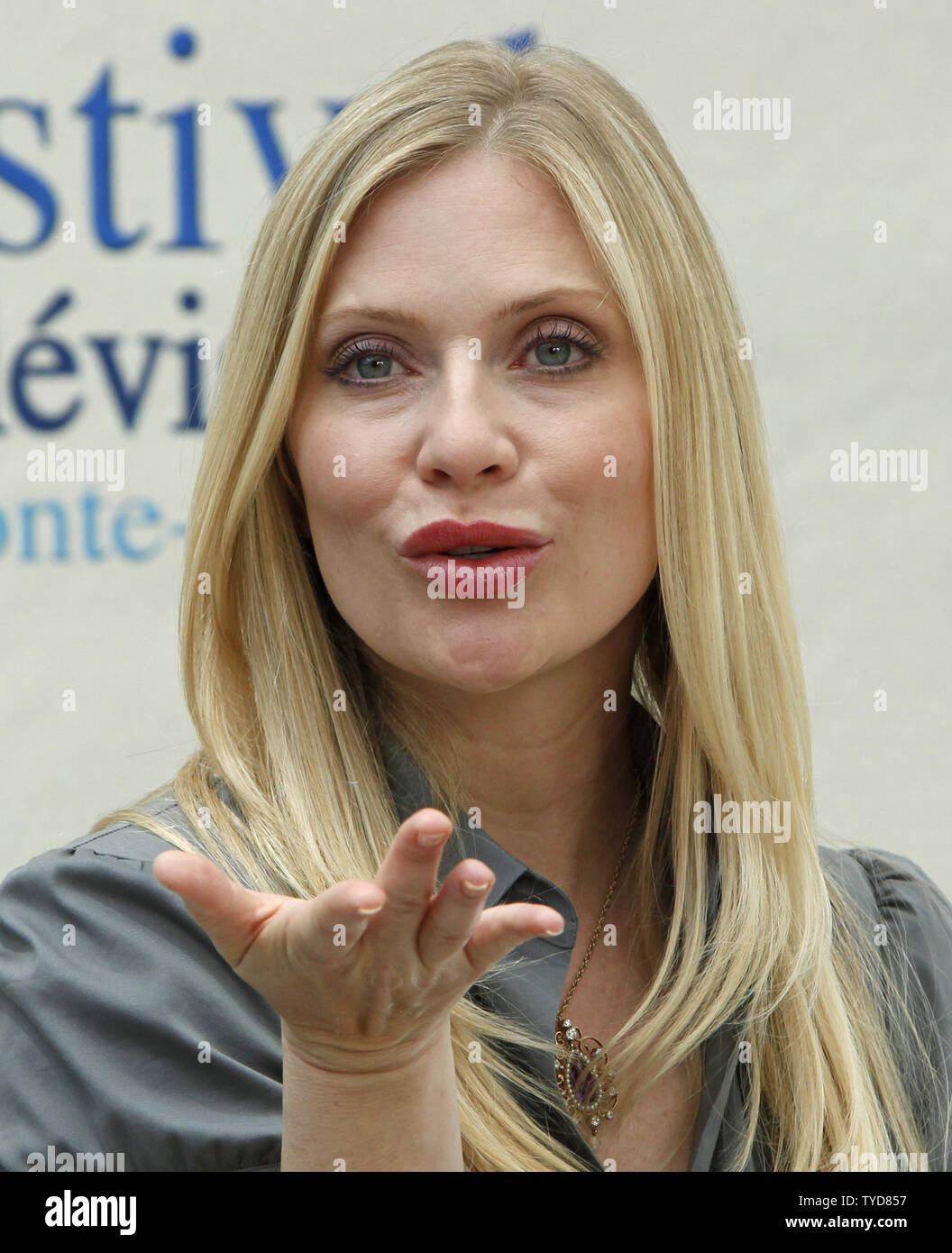 Actress Emily Proctor blows a kiss during a photocall for the television show 'CSI:  Miami' at the 49th Monte Carlo Television Festival in Monte Carlo, Monaco on June 11, 2009.  (UPI Photo/David Silpa) Stock Photo