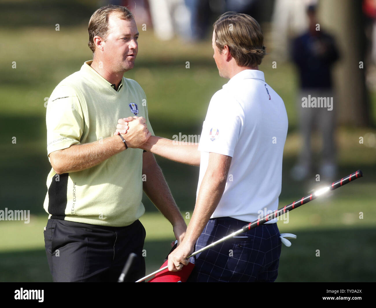 Team Europe's Peter Hanson, of Sweden, left, congratulates USA's Webb Simpson, right, after Simpson and Bubba Watson defeated Hanson and Paul Lawrie during Fourball match play at the 39th Ryder Cup at Medinah Country Club on September 28, 2012 in Medinah, Illinois.   UPI/Mark Cowan Stock Photo