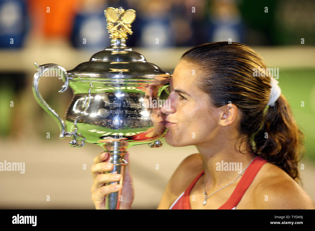 Justine Henin-Hardenne of Belgium seen with trophy after defeating Maria  Sharpova of Russia 7-5, 6-2 in the finals of the Dubai Tennis Championships  in Dubai, United Arab Emirates on February 25, 2006.