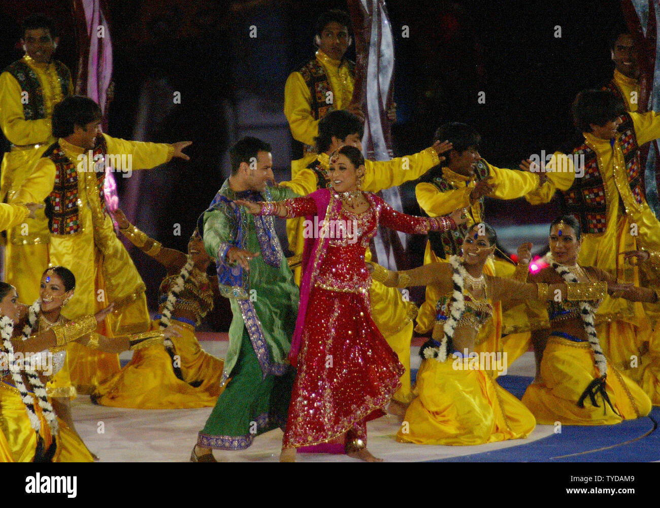 A Bhangra performance begins featuring Saif Ali Khan and Rani Mukherjee and 24 dancers at the Melbourne Cricket Grounds for the closing ceremonies of the XVIII Commonwealth Games on March 26, 2006.  Delhi, India will host the 2010 Commonwealth Games.  (UPI Photo/Grace Chiu) Stock Photo