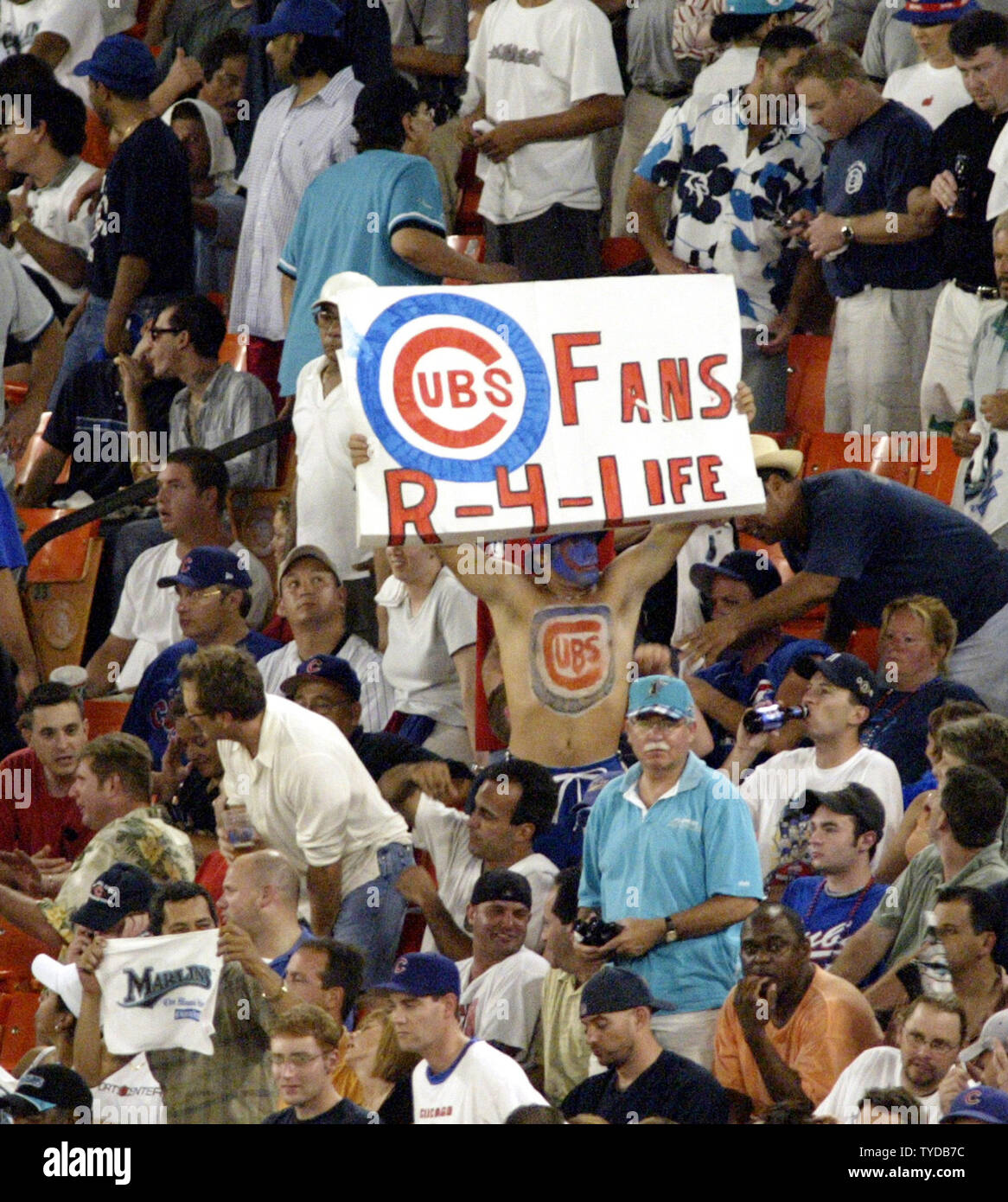 Chicago Cubs fans show their loyalty in Miami during game 3 of the NLCS, the Cubs take a 2-1 game lead with a 5-4 win in 11 innings at Pro Player Stadium, Miami, Florida, October 10, 2003.  (UPI/MICHAEL BUSH) Stock Photo