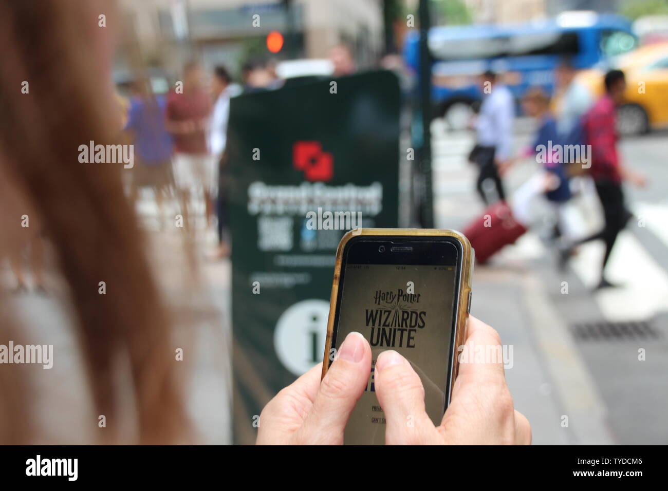 New York Usa 24th June 19 A Woman Looks At The Start Screen Of The Game Harry Potter Wizards Unite On Her Smartphone You Can Discover Magical Animals From The Books About