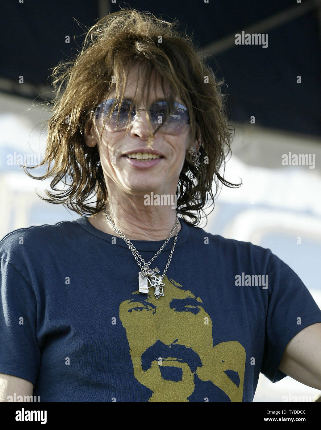 Image of STEVEN TYLER OF AEROSMITH HOLDS SON DURING MTVICON EVENT,  2002-04-15