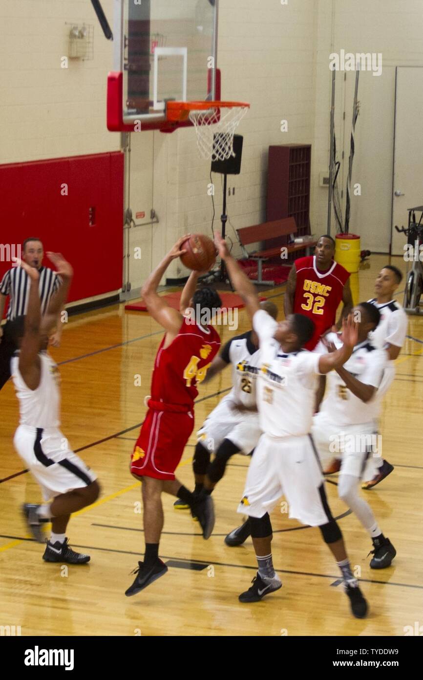 Lance Corporal Michael Morales Attempts To Score A Basket During