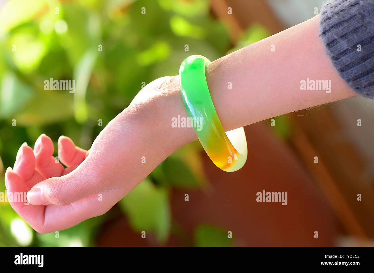 Jade bracelet wearing picture Stock Photo Alamy