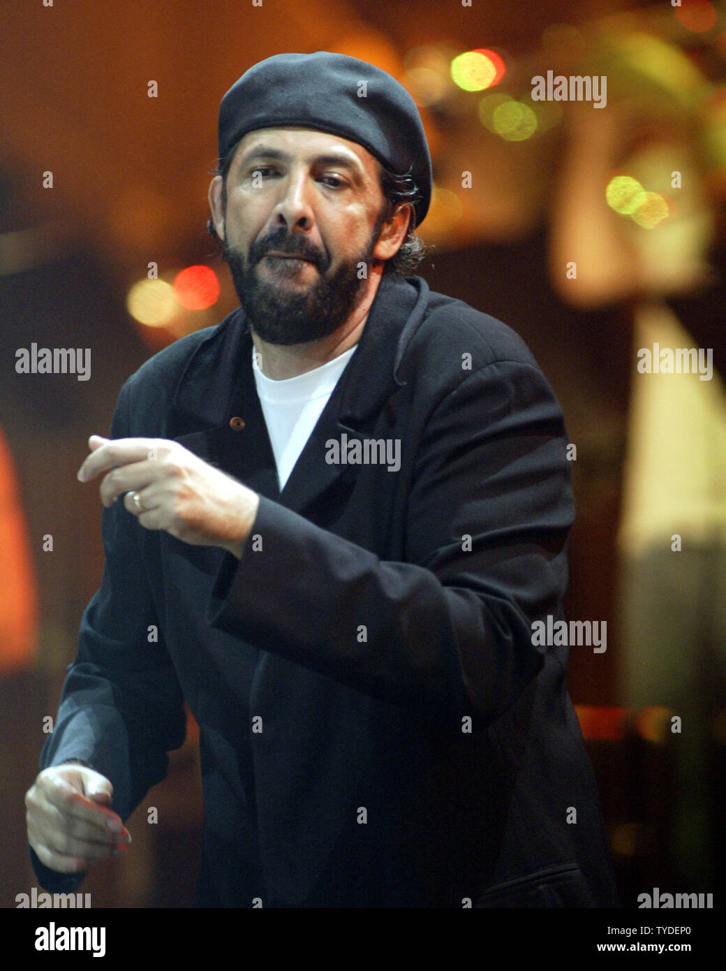 Juan Luis Guerra performs in concert , at the Miami Arena, in Miami